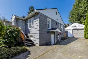 Driveway and large one car garage.