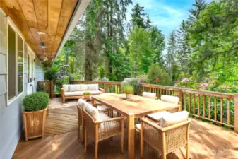 Large herringbone deck overlooking the large, private back yard.