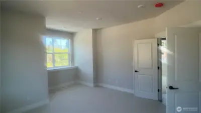 Another angle of the bonus room showing double doors