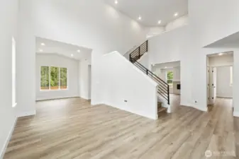 Look at all that light coming through all the windows.  LVP flooring throughout entire main floor, at stairs and upper hallways.