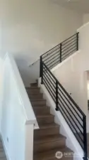 LVP flooring on main level, stair, and upper hallway. Stunning!