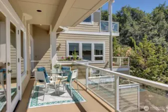 view of the decks on 2nd, and 2 primary bedrooms