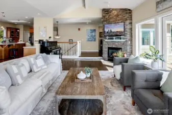 upper living / dining / kitchen, 1/2 bath & 2nd primary bedroom