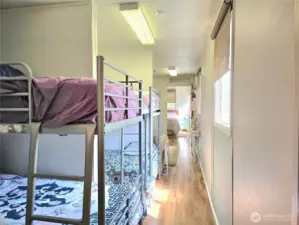 Keep the double bunk beds or add a kitchen.