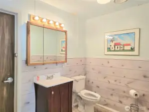 Half bath in bunk house with room to expand.