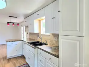 Cabinets with pantry space.