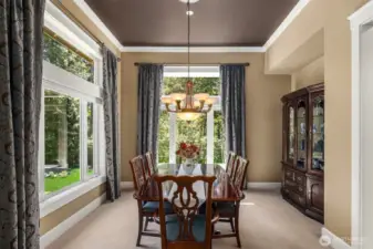 Large formal dining room, perfect for gatherings.