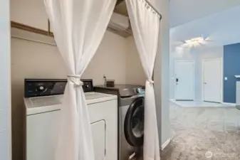 Great Laundry Space with overhead shelves
