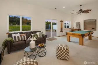 Rec room with pool table, bar, and wildlife sanctuary views.