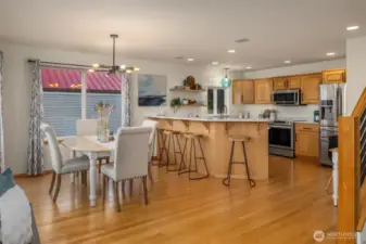 Spacious kitchen opens to dining and living areas