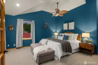 Luxury primary suite with private sound-view deck and cozy fireplace