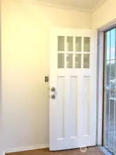 Craftsman front door entry way and back porch have locking security screen doors.