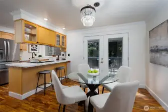 Gorgeous floors continue throughout the kitchen and dining space.