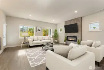 Bright, open-concept living room with virtual staging.