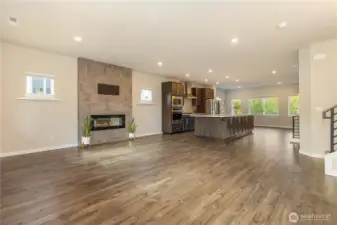 Bright, open-concept living room and kitchen.