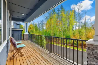 Spacious front balcony overlooking the greenbelt.