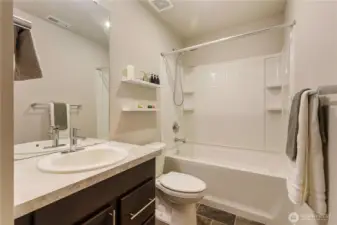Spacious full bathroom on the third floor.
