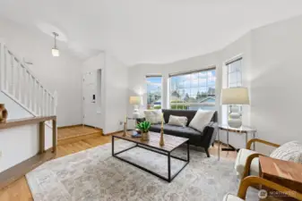 View from the dining room to the living room and entry.