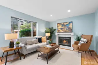 Family room with gas fireplace.  Note that the just refinished hardwood floors are throughout the main level.