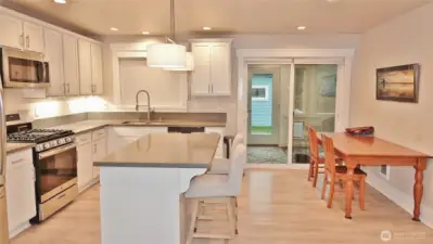 Kitchen and Dining Area with LVP flooring.