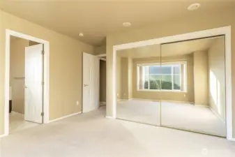 Primary Bath looking into Bath and out towards laundry room