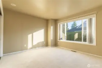 Spacious Primary Bed with natural lighting