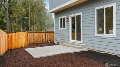 View of the “backyard”- could easily plant grass seed, etc.
