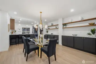 Dedicated dining area joining the kitchen and living areas.
