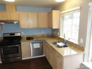Check out the updated kitchen! Plenty of counterspace and cabinets.