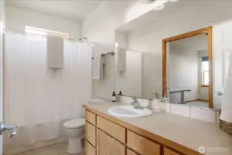 Main bathroom in the hallway.