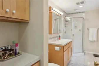 Lovely updated 3/4 bathroom with built-in vanity.