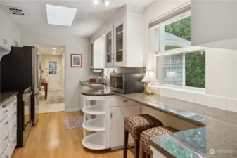 Tons of space in the kitchen with updated granite countertops.