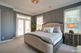 The French doors lead to the sunroom.