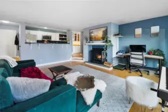 Kitchen overlooks living room.