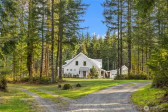 The home sits well off the private road, just around the bend in the driveway ~ welcome home!