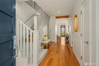 Welcoming entrance showcasing the gorgeous Reclaimed Fir Floors salvaged from an Oregon Nike Warehouse