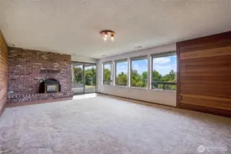 A huge bonus room with fireplace is a great hang-out space.