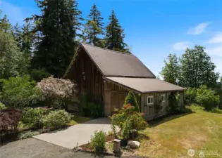 An amazing nostalgic 100+ year-old barn is an iconic part of this incredible 1.47 acres.