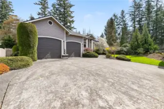 Beautiful mature landscaping all around the home