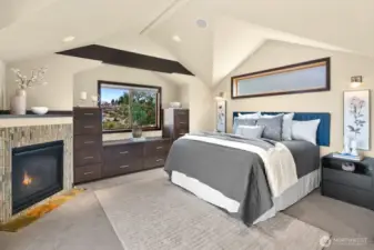 Built-in storage and fireplace make for a cozy experience every night in the primary suite