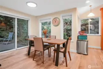 Dining area w/slider to outdoor deck.
