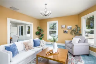 Spacious formal living room opens to the formal dining room through gorgeous French pocket doors. Bathed in light, you can bring in the ambiance of Old Town charm.