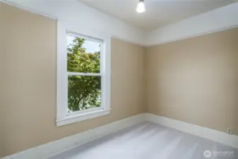 Third bedroom upstairs with Easterly exposure.