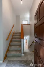 Entering from the back you can access both the upstairs and downs stairs. Both offering the same floor plan complete with 2 bathrooms, 2 bedrooms, laundry and kitchen.
