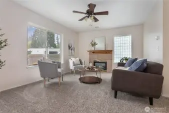 Brand new carpet throughout home & fresh paint. Cozy gas fireplace w/tile surround