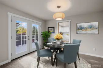 Dining Room with French Doors and Deck View VS