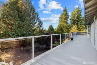 Deck Right runs the width of the house. Frech door access at each end of Deck. With stair access to back yard