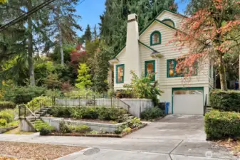 A rare Leschi find with an attached garage and two detached garages, this home offers both elegance and practicality near Lake Washington and the Madronna neighborhood.