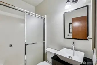 Bathroom next to the family room. Updated vanity.