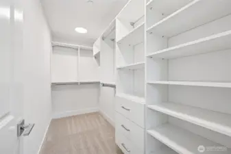 One of two walk in closets in the primary